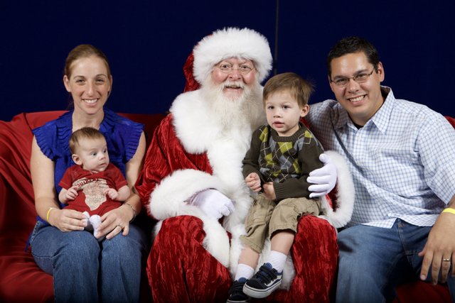 The Family's Festive Photo with Santa