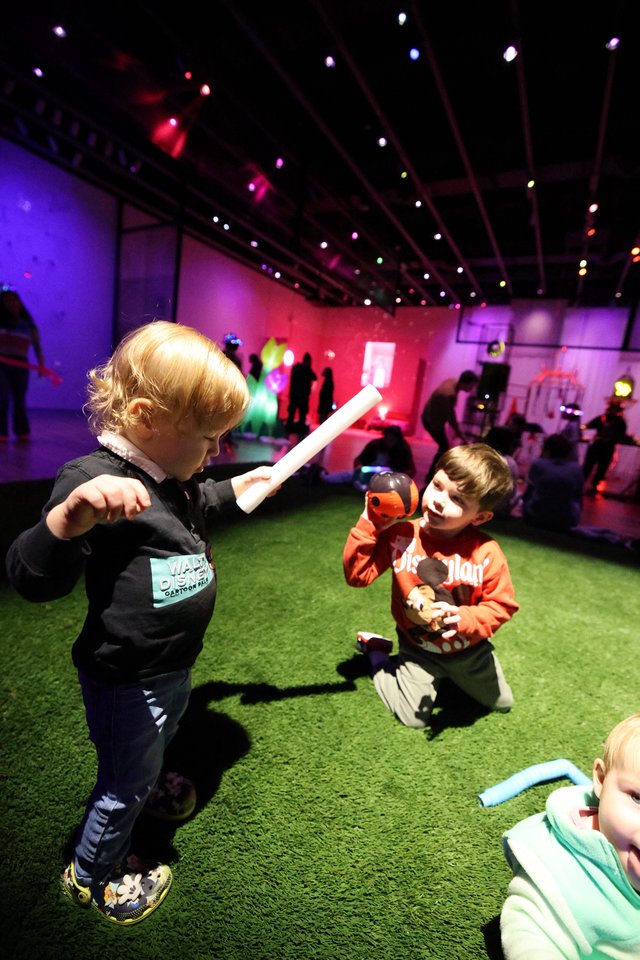 Children Playing at Baby Rave Light Installation