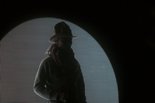 Silhouette of a Man in a Sun Hat