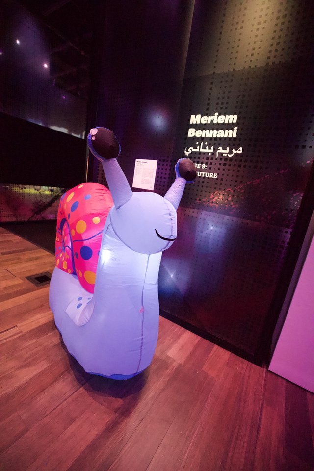 Whimsical Inflatable Snail Art Installation at Museum