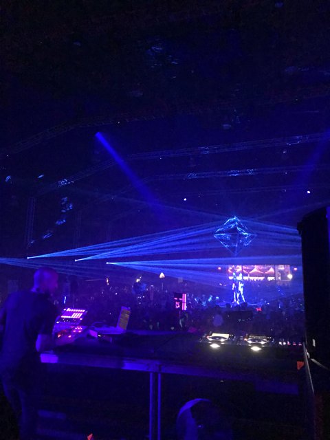 Nightclub DJ rocks the stage with electrifying performance