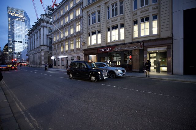 Evening Traffic on London Street at Twilight