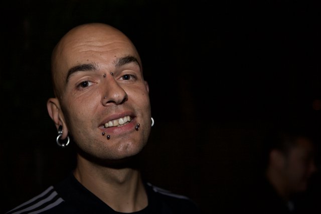 Bald Man with Piercings