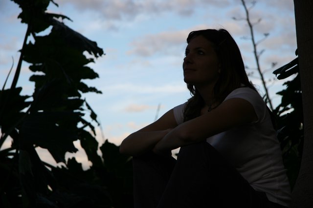 Contemplative Woman Gazing at Twilight Sky