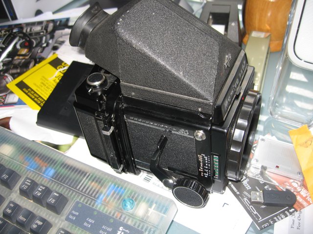 Digital Camera and Computer Hardware on Desk