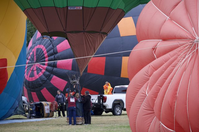 Ground Crew Prepares Hot Air Balloons for Launch