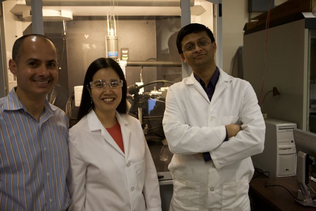 Three Scientists in Lab Coats