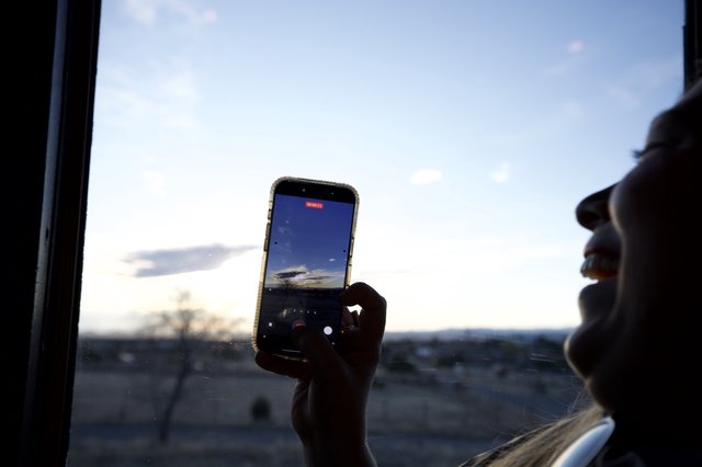 Capturing the Desert Sunset Through a Phone Screen