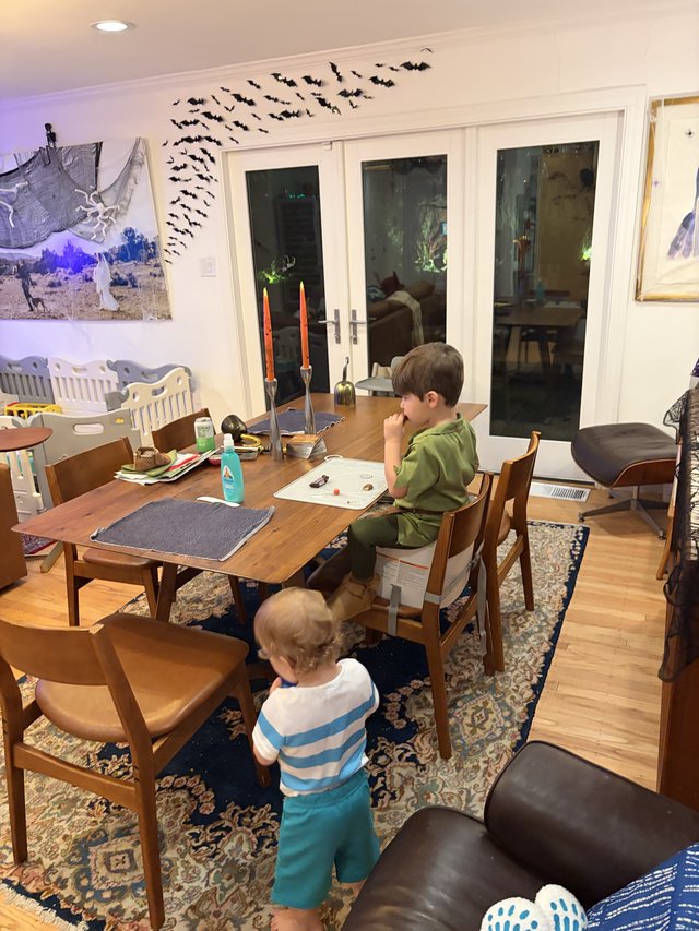 Brothers Enjoying Halloween Evening at Home
