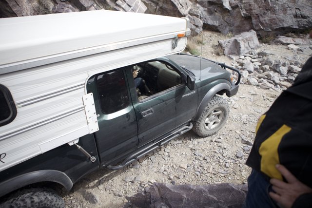 Adventurous Camper on a Pickup Truck