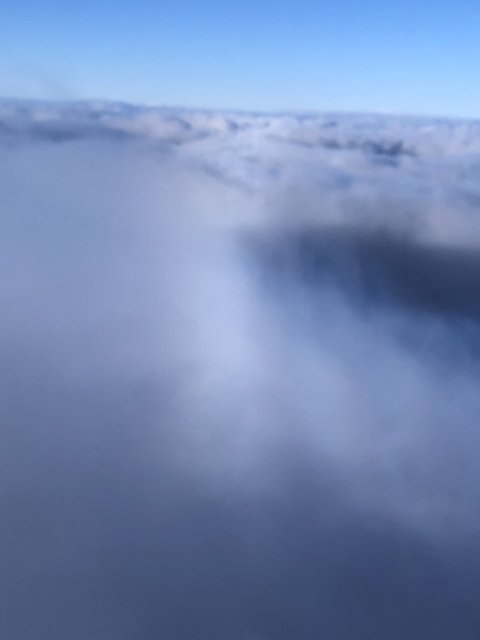 Above the Misty Skies