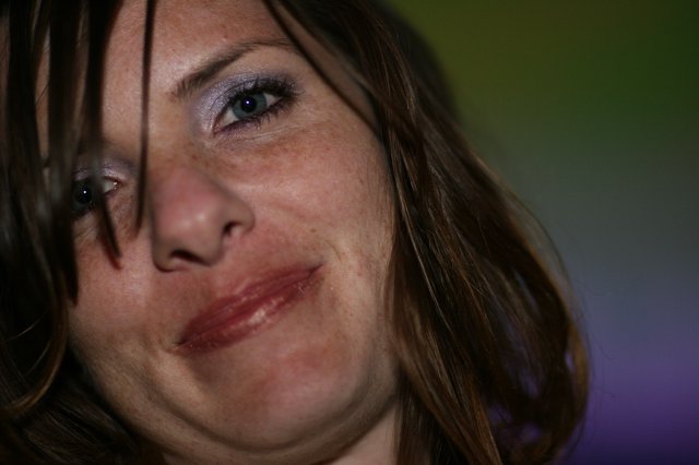 Intimate Close-Up Portrait of Woman at Nightclub Event