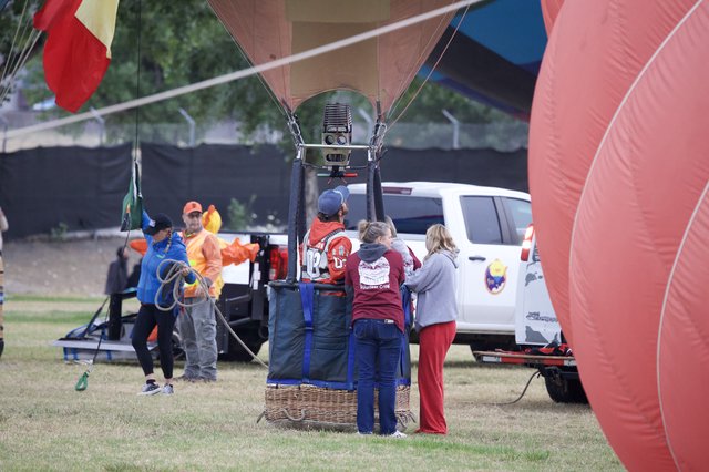 Ground Crew Prepares Hot Air Balloon for Launch