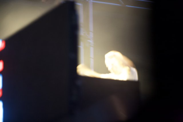 Blurry Silhouette of a Performer on Stage