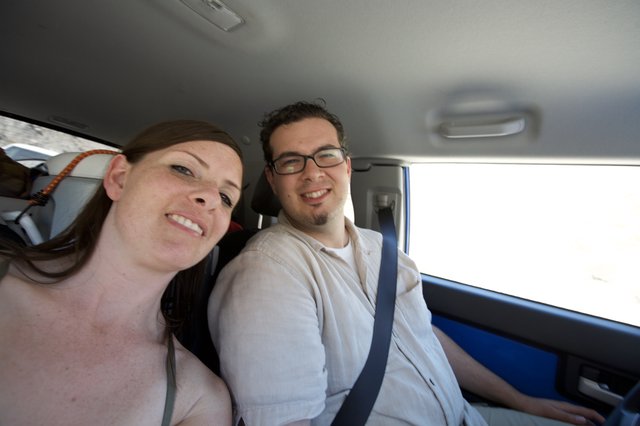 Dave and Penelope Smiling on a Desert Road Trip