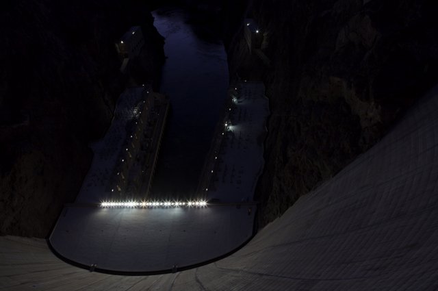 Illuminated Hoover Dam at Night