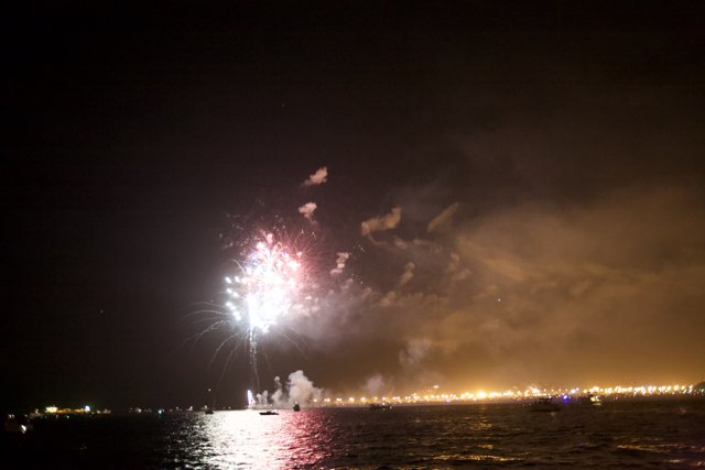 Spectacular Fireworks Display Reflects on Water
