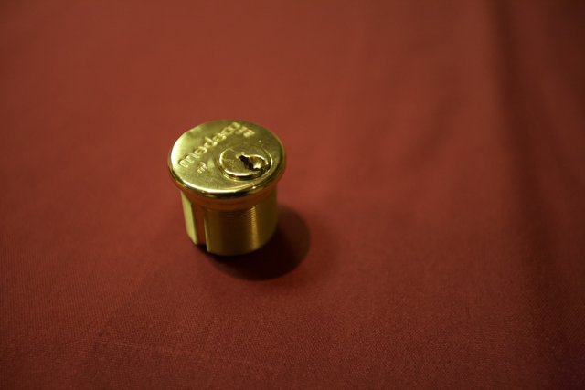 Golden Cap on Red Table