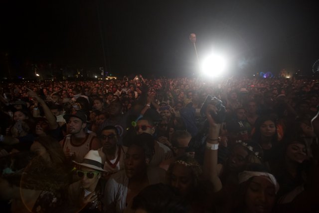 Festivalgoers Illuminate the Night
