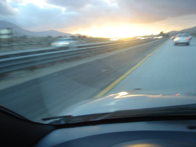 Driving into the Sunset on the Freeway