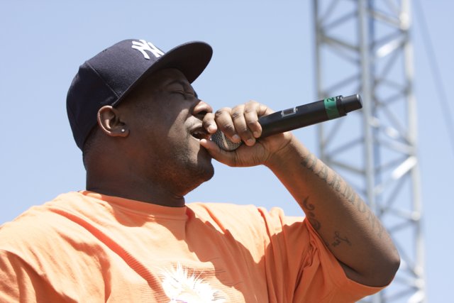 Tyree Guyton Performs at Coachella in Orange Shirt
