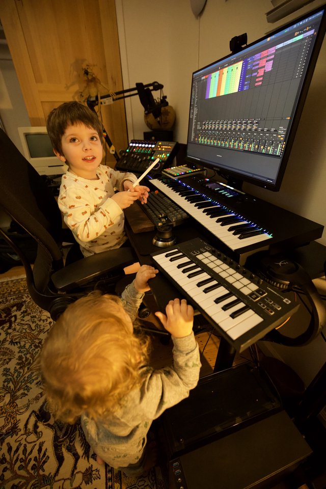 Young Children Learning Music Production at Home Studio