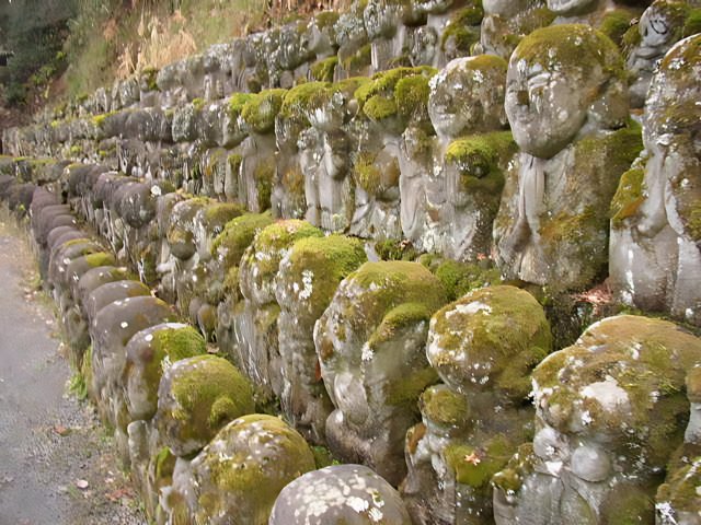 Moss-Covered Stone Statues