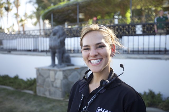 Smiling Woman with Headphones enjoying Coachella