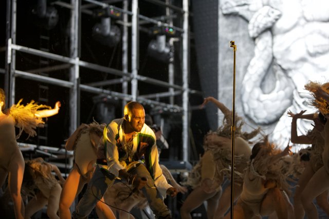 Kanye West Joins Dancers on Stage