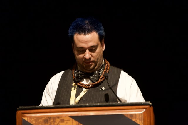Blue-haired Man Speaks at DefCon Conference