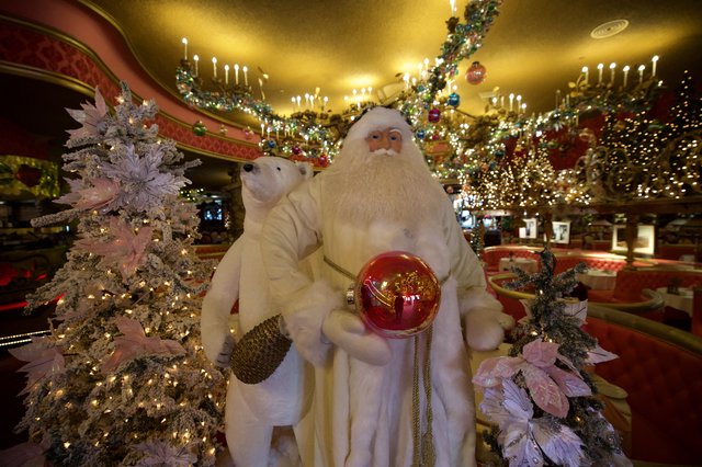 Winter White Santa Display in Elegant Restaurant