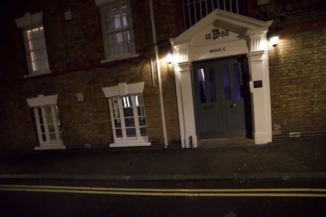 Historic London Building Entrance at Night - Block C 1888