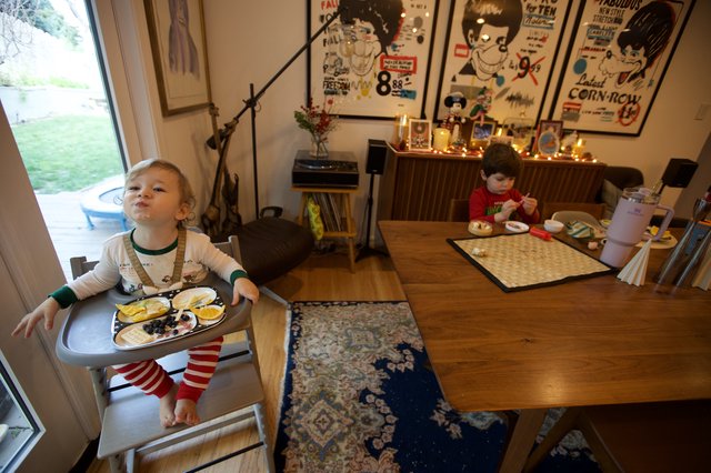 Children Enjoying Breakfast on Christmas Eve Morning