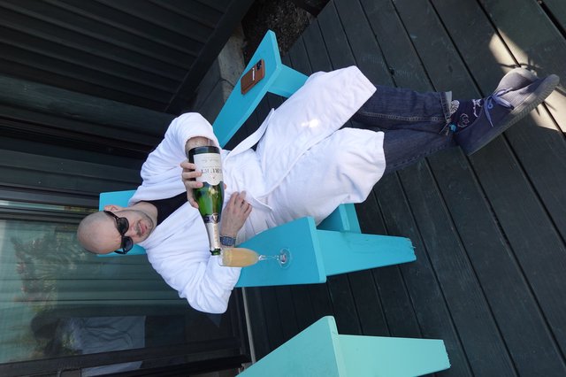 Relaxing in Style with Champagne and Bathrobe
