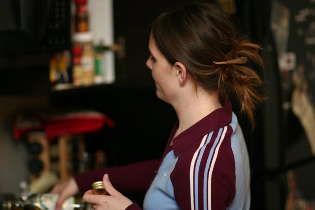 Woman in Kitchen Holding a Jar, 2006
