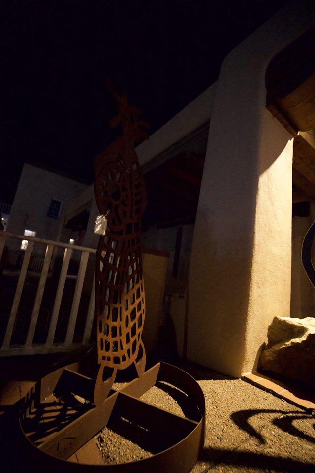 Illuminated Sculptural Art Installation at Night Courtyard