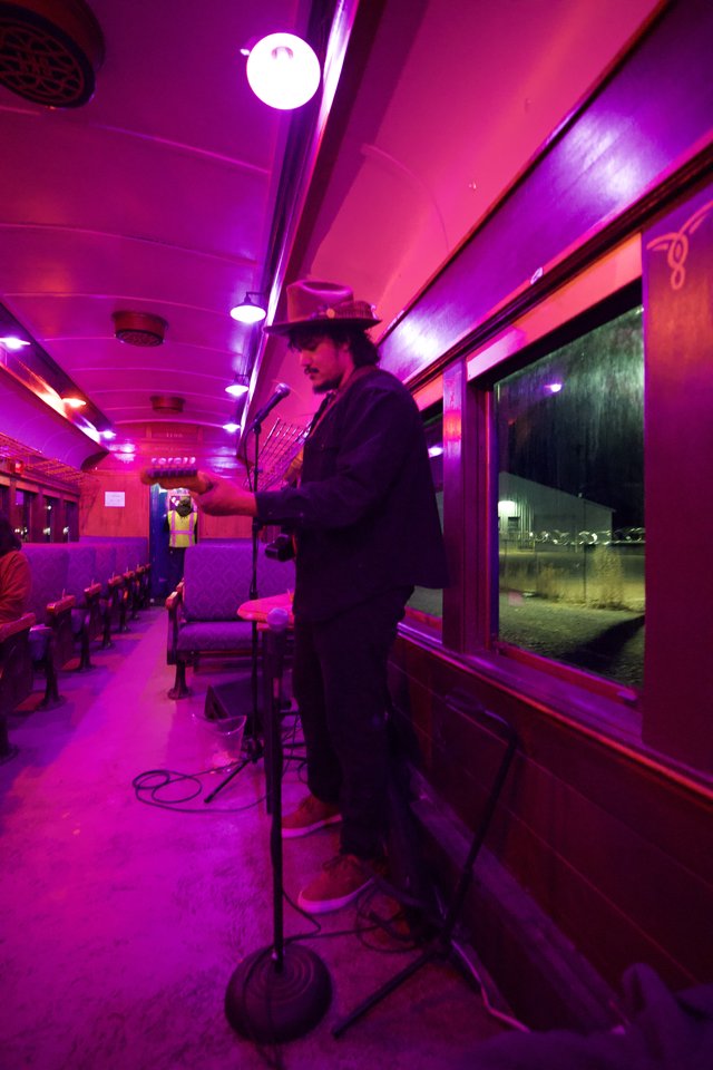Late Night Diner Car with Vibrant Pink Lighting