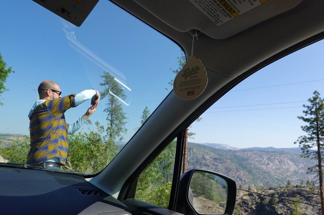 Mountain Road Photography Session Through Windshield View