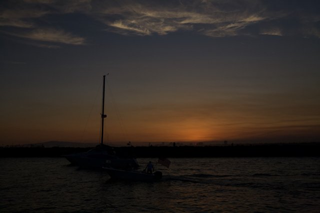 Serene sailboats at sunset