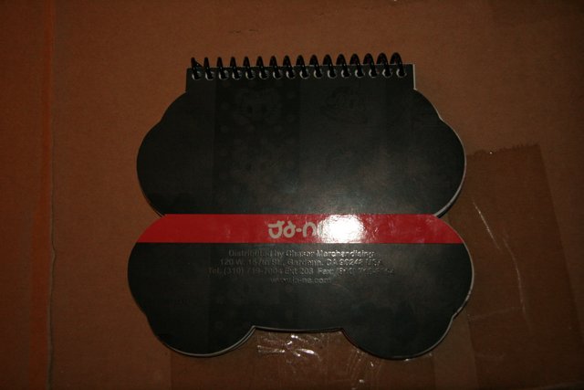 Black Notebook with Red Ribbon