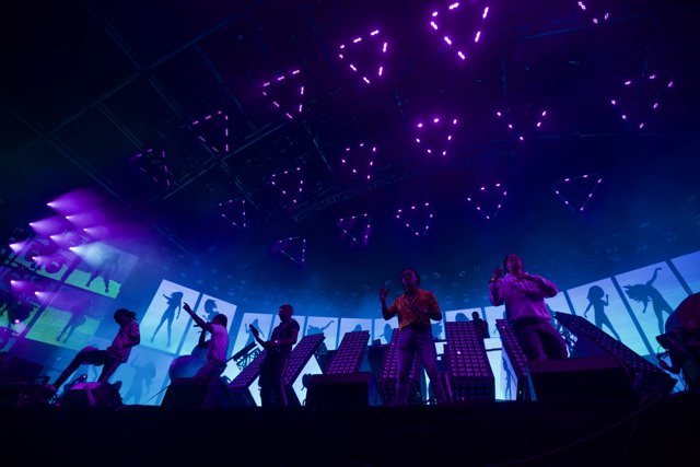 Group Performance Under Purple Lights