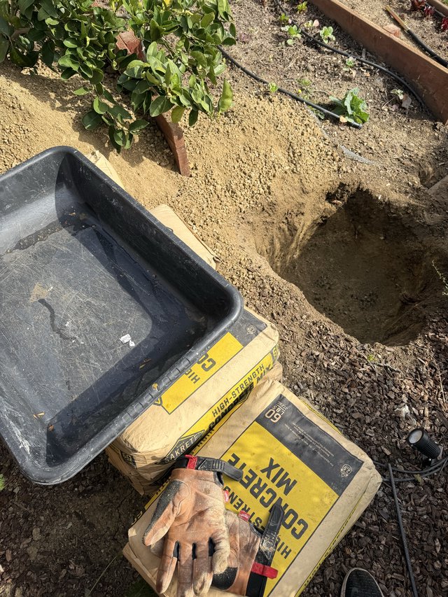 Garden Construction Work with Concrete Mix and Tools
