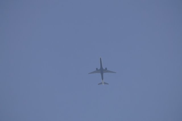 Jetliner Soaring in El Sereno Sky