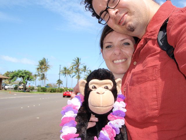 Couple Poses with Monkey Plush in Hawaii