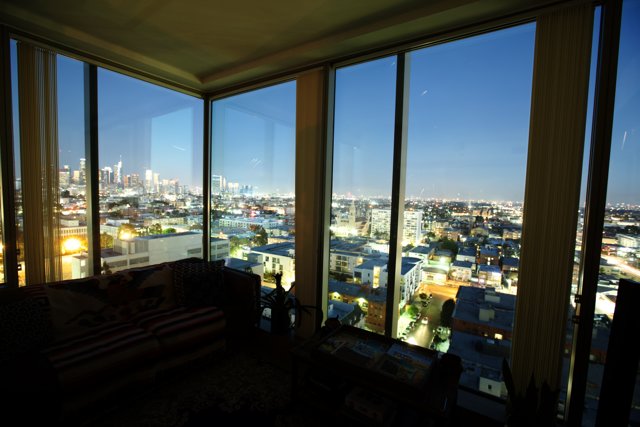 Cityscape View from a Cozy Living Room