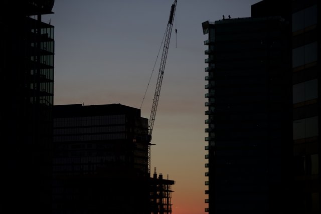 Crane Construction at Sunset