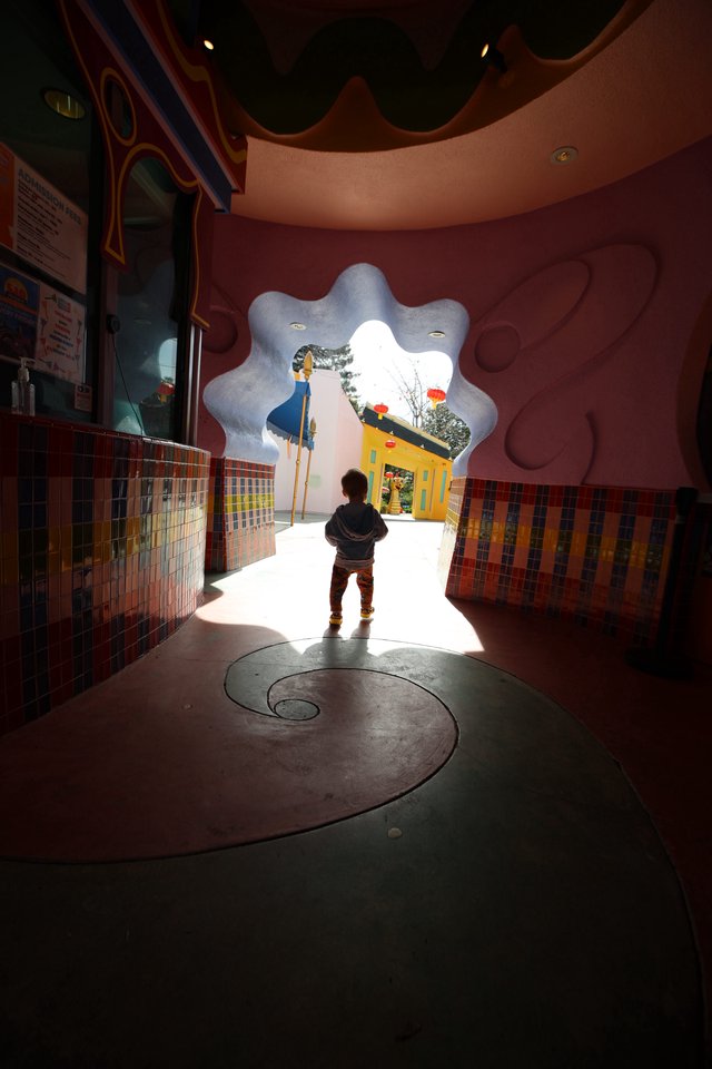 Child Exploring Whimsical Themed Play Space