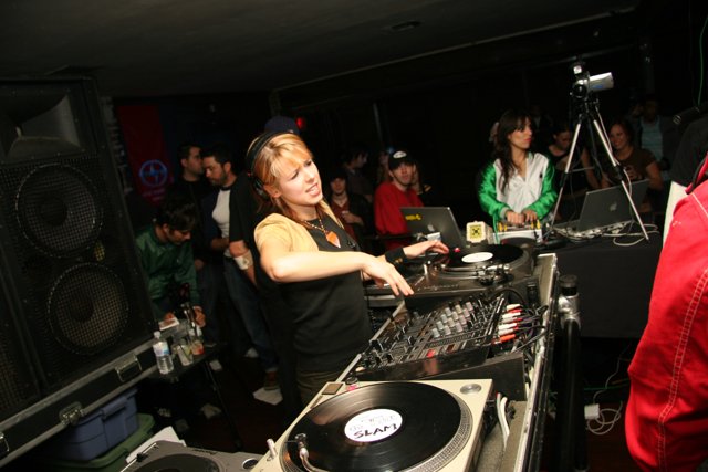 DJ Reid Speed mixing beats at a nightclub