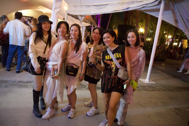 Evening Elegance at Coachella 2024: A Vivid Display of Style and Friendship