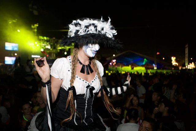 Costumed Woman Rocks the Concert